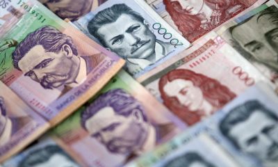Las sombras que se posan sobre el peso colombiano en el 2022