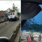 Una ambulancia 'llena' y un hombre en medio del carril MIO, que murió en el lugar tras el golpe