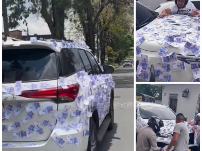 La camioneta del 'millonario' dona dinero en las calles de Cali