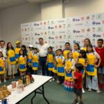 Los niños grandes anfitriones en la Feria Internacional de Café, Cacao y Agroturismo