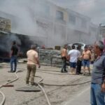 Incendio estructural en un almacén y montallantas en Armenia