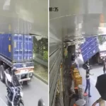 ENVIDEO | ¡Milagro! Container cae de una tractomula y por poco aplasta a motociclista