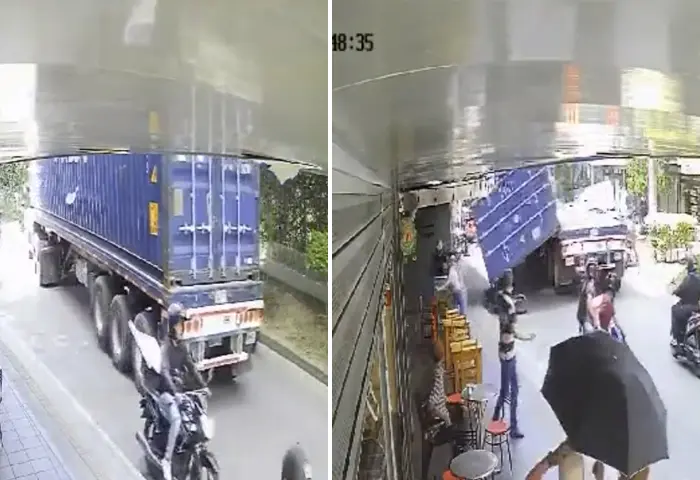 ENVIDEO | ¡Milagro! Container cae de una tractomula y por poco aplasta a motociclista