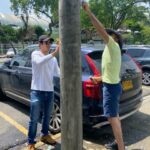 Ciudadanos de Cali se unen para limpiar postes y árboles de publicidad no permitida