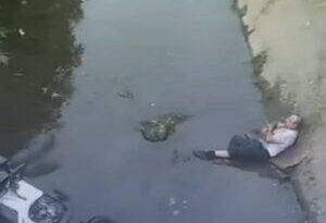 Distracción en celular le costó caída a canal de aguas negras