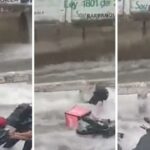 Video: arroyo en Barranquilla se llevó a motociclista, hombre fue rescatado de milagro