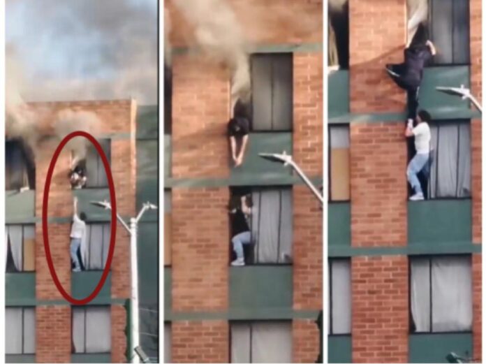 Joven salvó a mujer y a su perro de un incendio: los sacó por la ventana, en un edificio