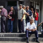 Fila de pensionados.